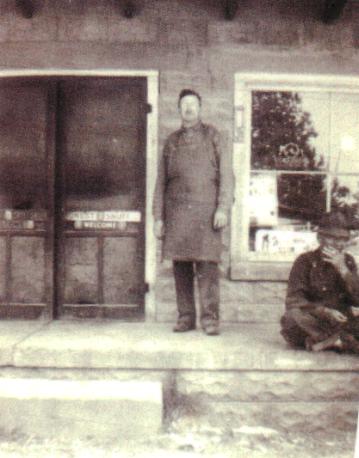 Jack Hovious standing outside his store